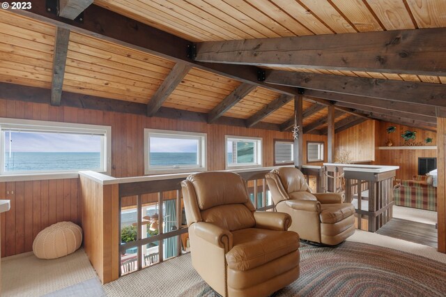 carpeted bedroom featuring wood ceiling, wood walls, and lofted ceiling with beams