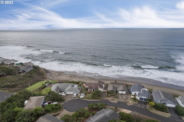 birds eye view of property with a residential view and a water view