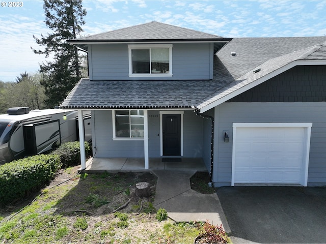 front facade with a garage