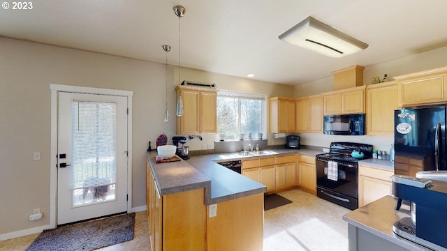 kitchen featuring kitchen peninsula, light brown cabinets, pendant lighting, and black appliances