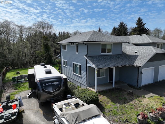 view of property with a garage