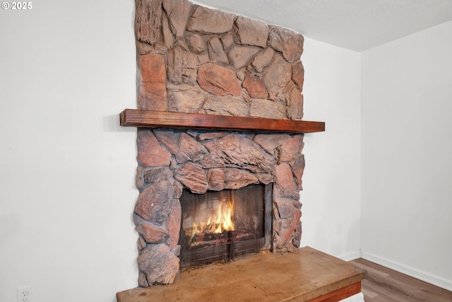 25191 Berry Ln, Veneta, OR 97487 - detailed view of wood finished floors and a fireplace