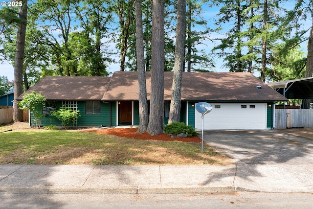 25191 Berry Ln, Veneta, OR 97487 - ranch-style house featuring roof with shingles, concrete driveway, a garage, and a carport