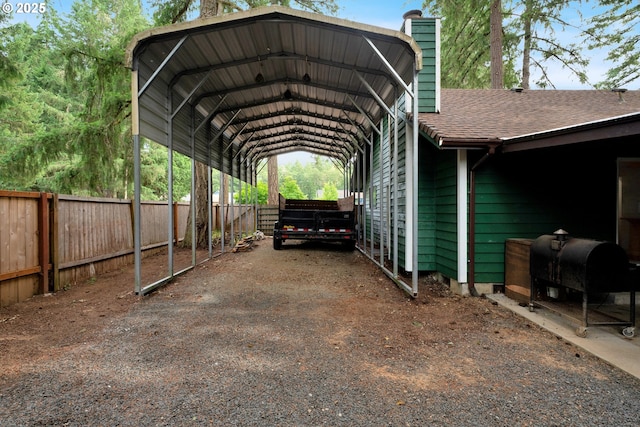 25191 Berry Ln, Veneta, OR 97487 - view of vehicle parking featuring a detached carport, oil tank, and driveway