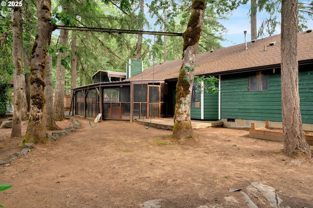 25191 Berry Ln, Veneta, OR 97487 - rear view of house with a sunroom, roof with shingles, a chimney, and crawl space