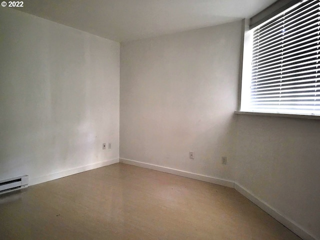 empty room with a baseboard radiator