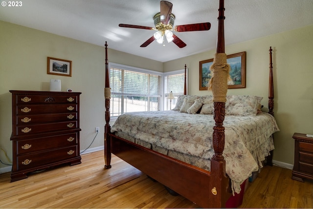 bedroom featuring ceiling fan and light wood-type flooring