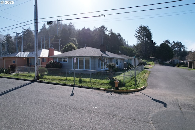 29545 Bailor St, Gold Beach, OR 97444 - ranch-style house featuring a chimney