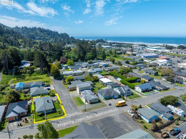 29545 Bailor St, Gold Beach, OR 97444 - aerial perspective of suburban area with property boundaries highlighted and a nearby body of water