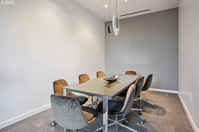 view of carpeted dining area