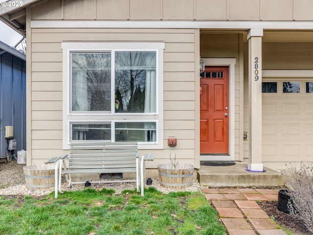 property entrance featuring a garage