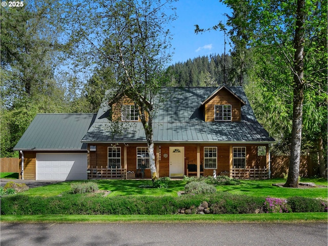 65679 E Alpine Way, Rhododendron, OR 97049 - view of front facade with a porch, a garage, driveway, and metal roof