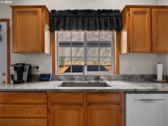 65679 E Alpine Way, Rhododendron, OR 97049 - kitchen with a sink, dishwasher, a wealth of natural light, and brown cabinets