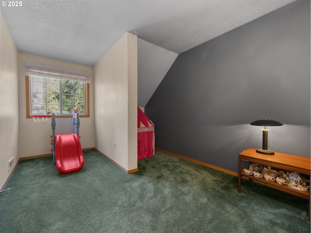 65679 E Alpine Way, Rhododendron, OR 97049 - rec room with a textured ceiling, visible vents, vaulted ceiling, carpet floors, and baseboards