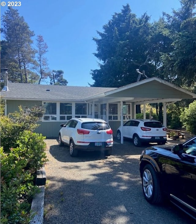 4590 Perpetua St, Florence, OR 97439 - view of parking featuring a carport