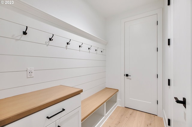 mudroom with light hardwood / wood-style flooring