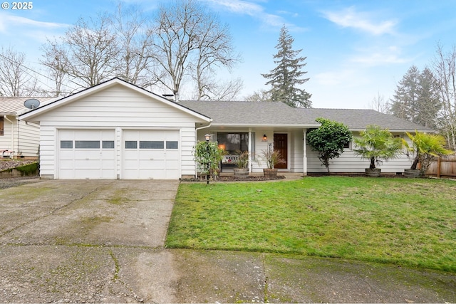 ranch-style house featuring a garage and a front yard