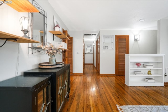 hallway featuring dark wood-type flooring