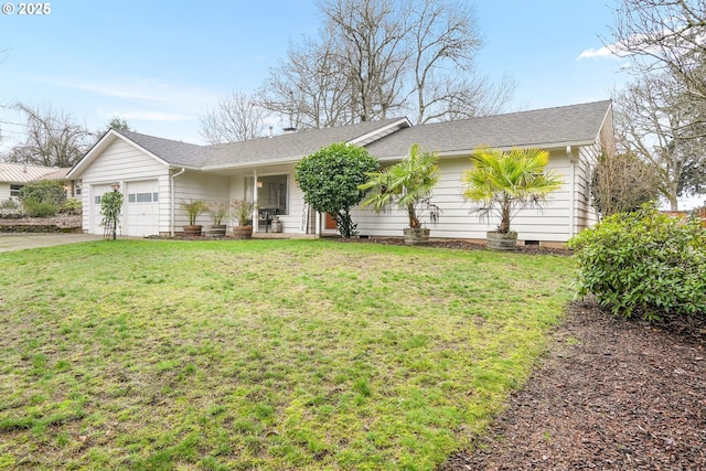 ranch-style home with a garage, a front yard, and covered porch