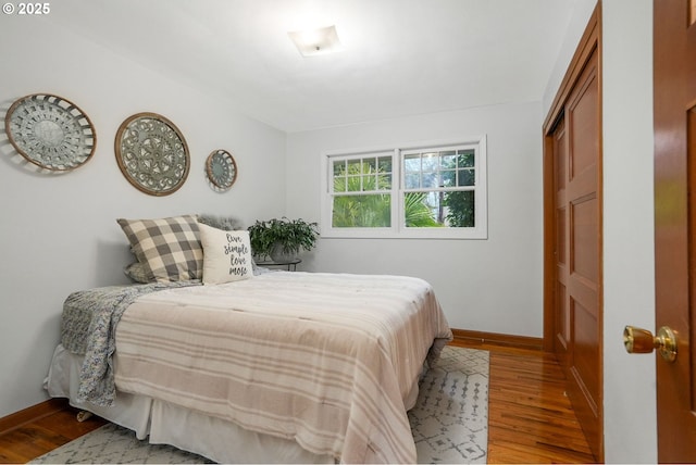 bedroom with light hardwood / wood-style flooring