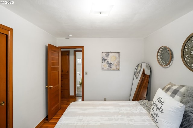 bedroom with light wood-type flooring