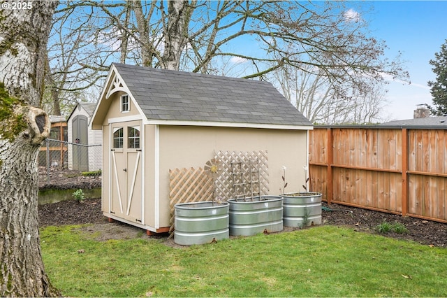 view of outbuilding featuring a yard