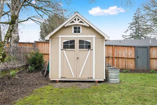 view of outbuilding with a yard