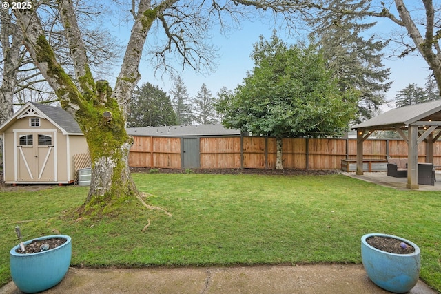 view of yard with a storage shed, a gazebo, an outdoor hangout area, and a patio area