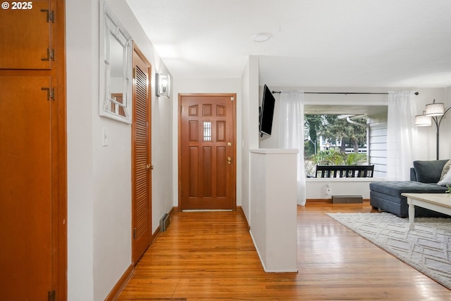 corridor featuring light hardwood / wood-style flooring