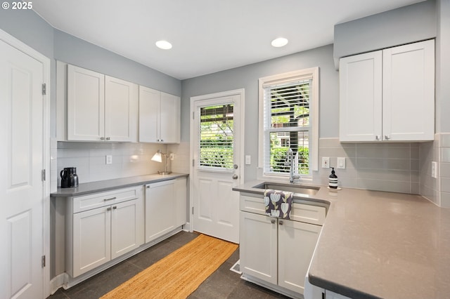 420 S State St, Lake Oswego, OR 97034 - kitchen featuring white cabinetry, decorative backsplash, recessed lighting, and light countertops