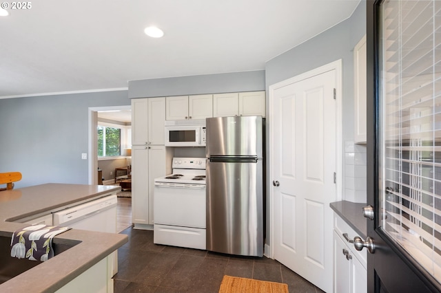 420 S State St, Lake Oswego, OR 97034 - kitchen featuring white appliances, white cabinets, recessed lighting, and ornamental molding