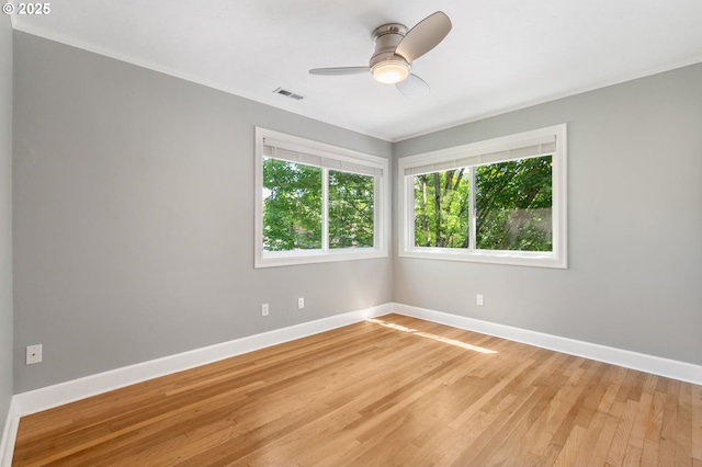 420 S State St, Lake Oswego, OR 97034 - spare room with light wood-style flooring, ceiling fan, and crown molding
