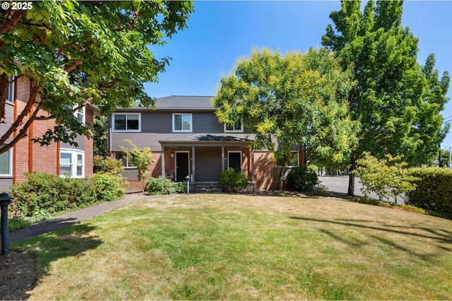 420 S State St, Lake Oswego, OR 97034 - traditional-style house featuring a front yard, a porch, and brick siding