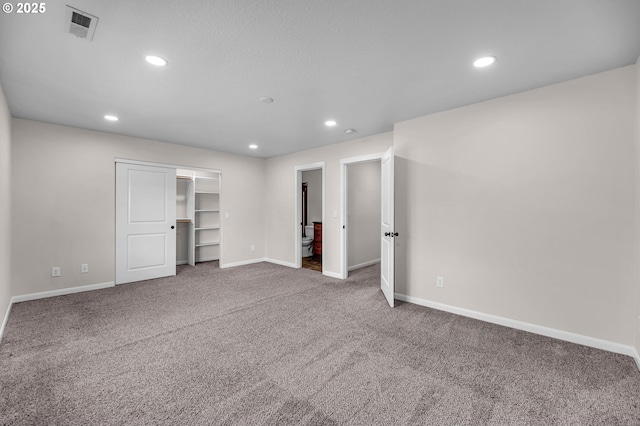 3707 NE Minnehaha St, Vancouver, WA 98661 - interior space with a walk in closet, carpet floors, visible vents, baseboards, and recessed lighting