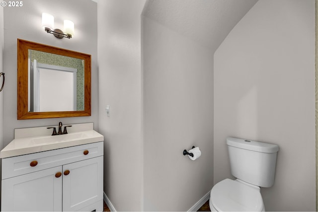 3707 NE Minnehaha St, Vancouver, WA 98661 - bathroom with toilet, vaulted ceiling, and vanity
