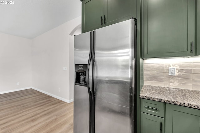 3707 NE Minnehaha St, Vancouver, WA 98661 - kitchen with light wood-style flooring, stainless steel refrigerator with ice dispenser, and green cabinetry