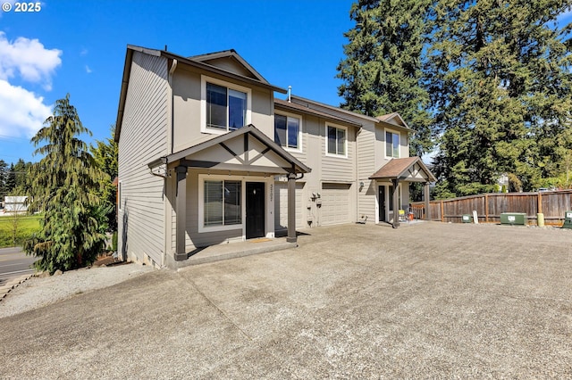 3707 NE Minnehaha St, Vancouver, WA 98661 - view of front facade featuring concrete driveway, fence, and a garage