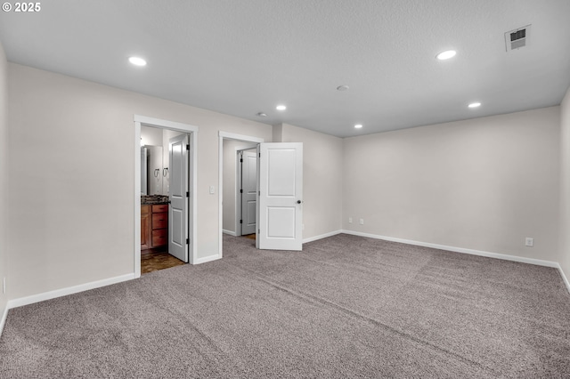 3707 NE Minnehaha St, Vancouver, WA 98661 - interior space featuring visible vents, baseboards, and dark carpet