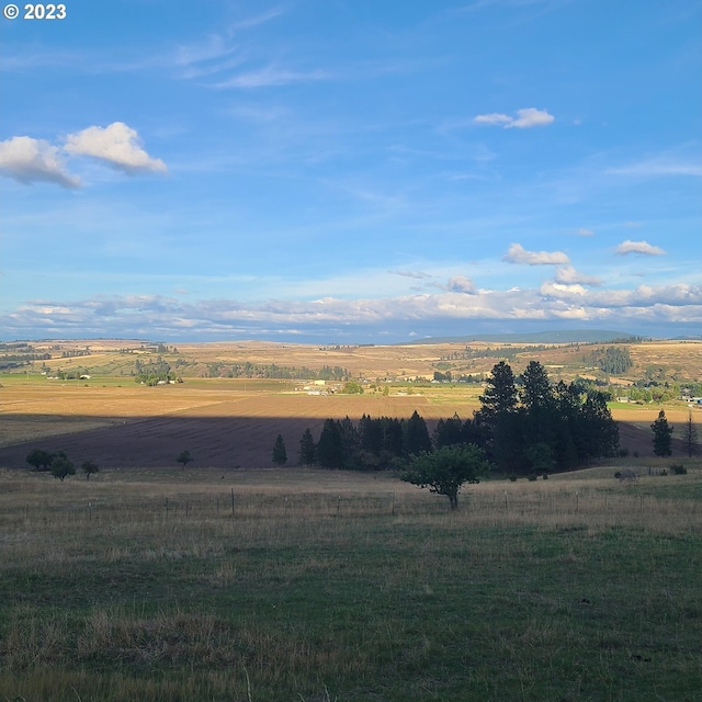 view of mountain feature featuring a rural view