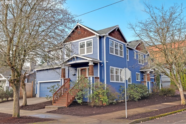 townhome / multi-family property featuring an attached garage and driveway