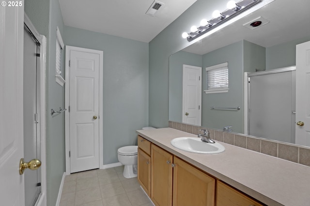 full bath with visible vents, toilet, a shower with shower door, tile patterned floors, and vanity