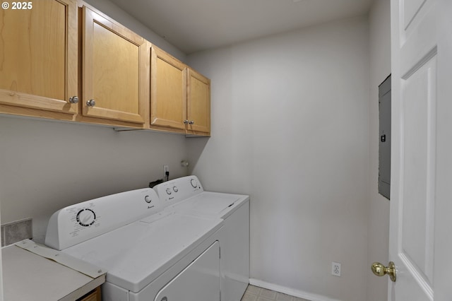 laundry area with electric panel, cabinet space, and washer and clothes dryer