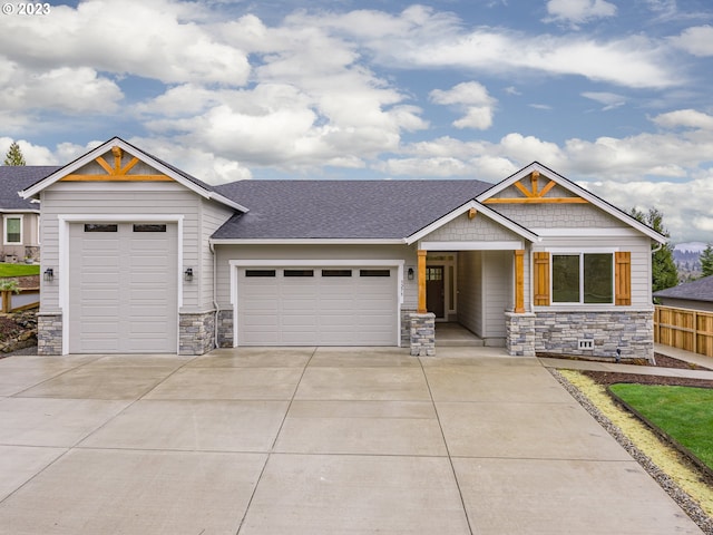 craftsman inspired home with a garage