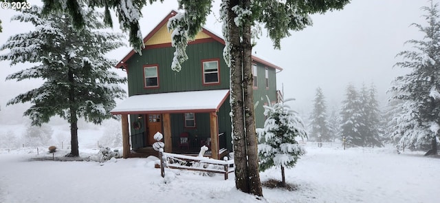 view of snow covered property