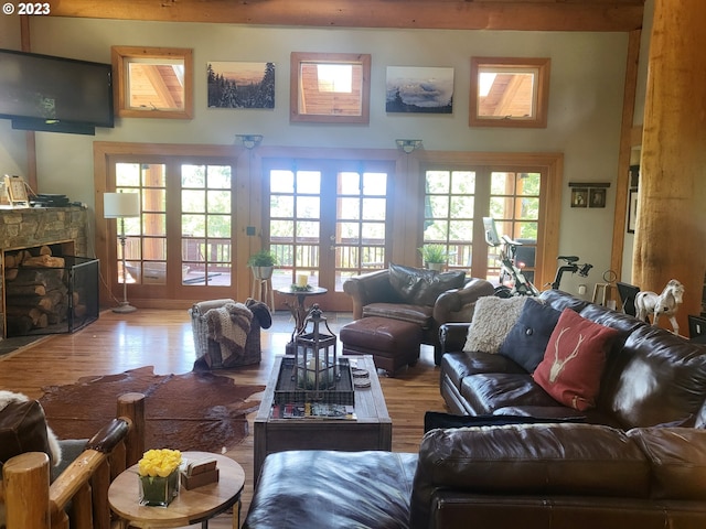 living room featuring french doors and hardwood / wood-style flooring