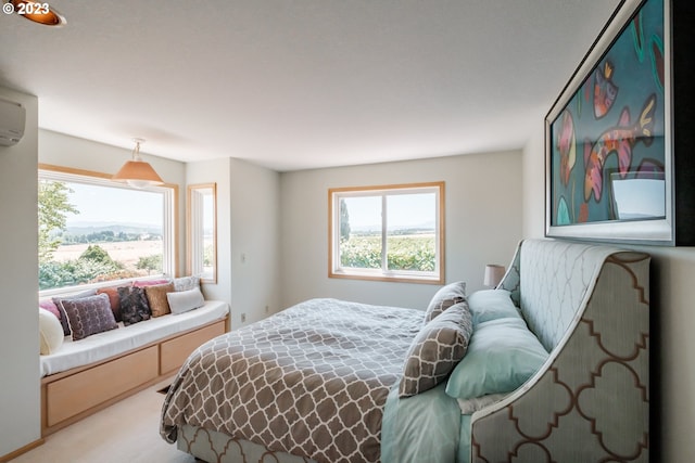 bedroom with carpet, an AC wall unit, and multiple windows