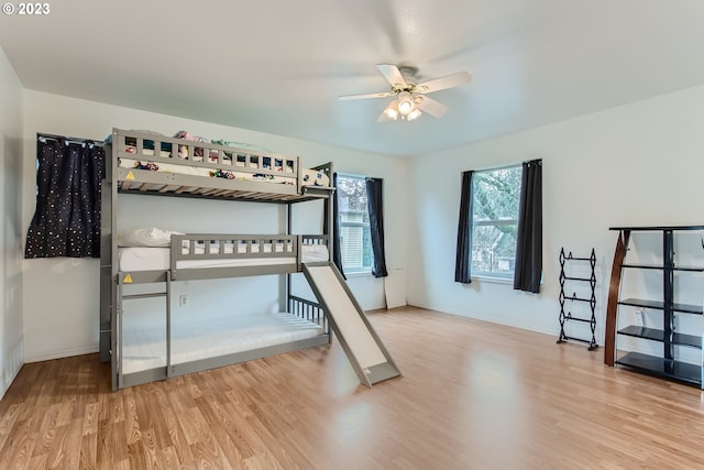 unfurnished bedroom featuring ceiling fan and light wood-type flooring