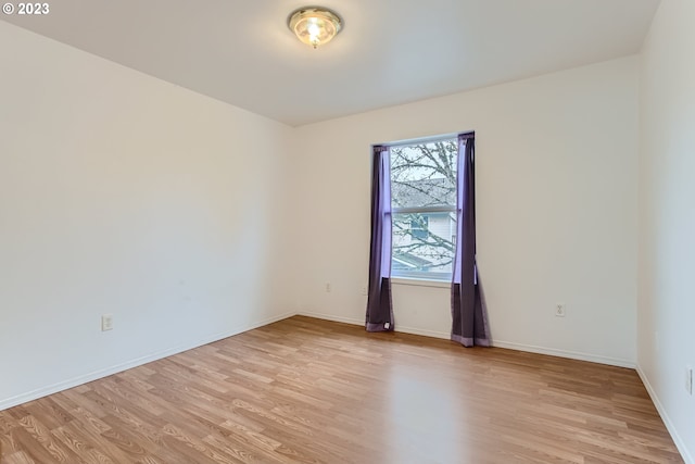 empty room featuring light hardwood / wood-style floors