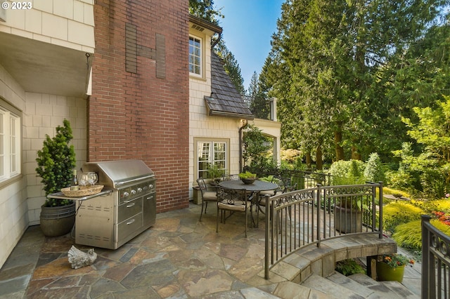 view of patio / terrace with grilling area and an outdoor kitchen