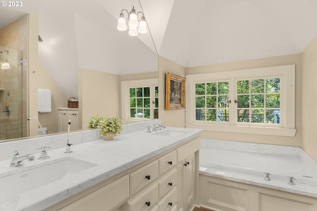 bathroom with independent shower and bath, dual bowl vanity, vaulted ceiling, and a wealth of natural light